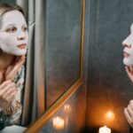 A-Woman-With-Sheet-Mask-Looking-at-the-Mirror