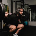 Bearded-Man-in-Black-Long-Sleeve-Shirt-Weightlifting
