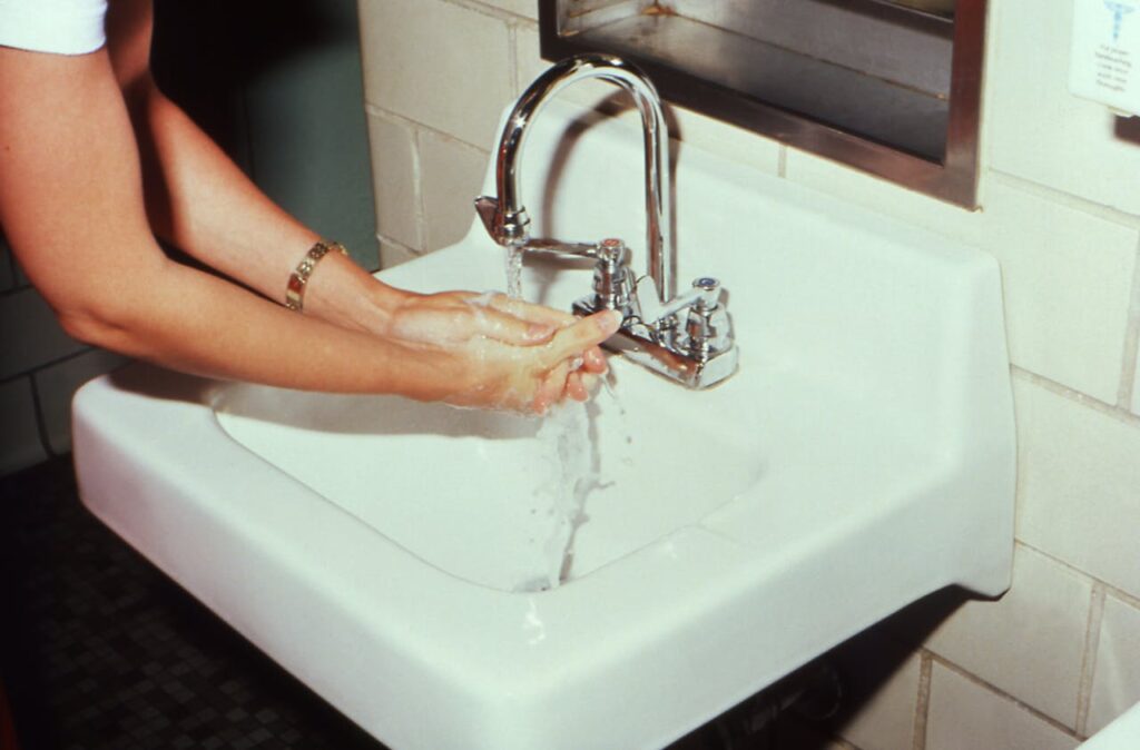 Person-Washing-Hands-on-Sink