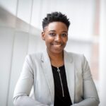 Woman-Wearing-Gray-Notch-Lapel-Suit-Jacket