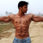 man-showing-Four-Pack-Abs