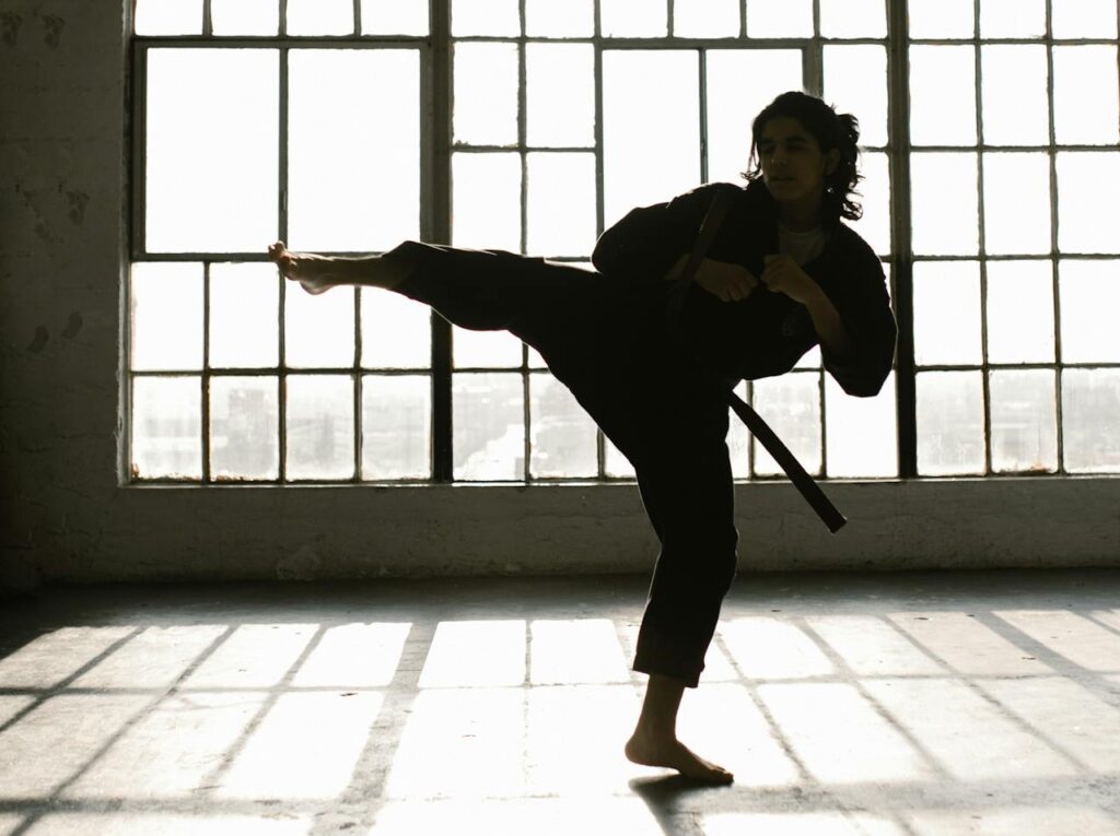 person-performing-scissor-kick