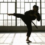 person-performing-scissor-kick