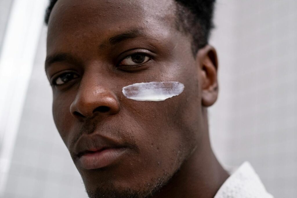 Close-up-of-Man-With-White-Cream-on-Face