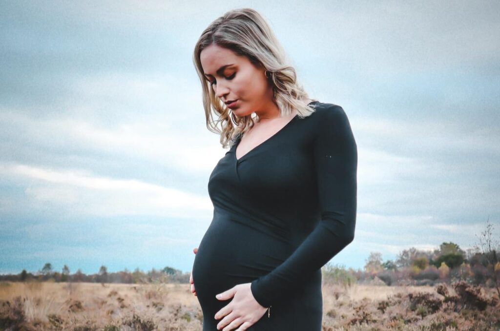 Pregnant-Woman-Wearing-Black-Dress