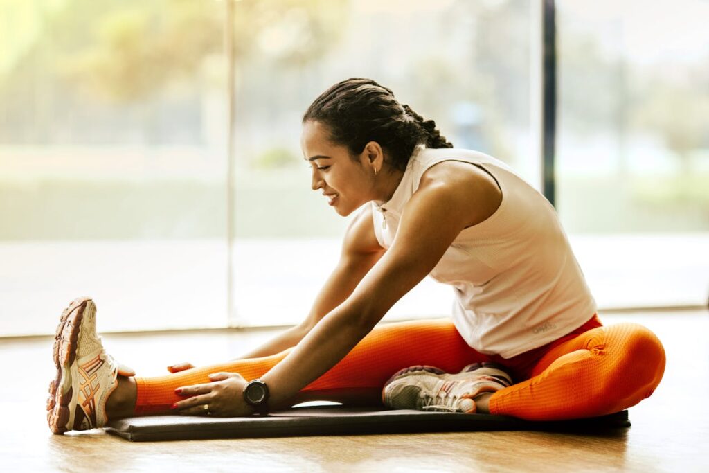 Woman-Stretching-on-Ground