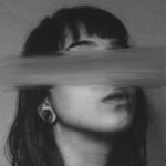 Woman-with-smeared-eyes-in-studio